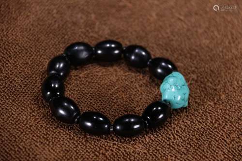 A Chinese Turquoise Stone Sherpa Glass Bead Bracelet