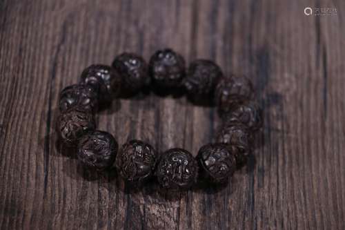 A Chinese Agarwood Beast Carved Bracelet