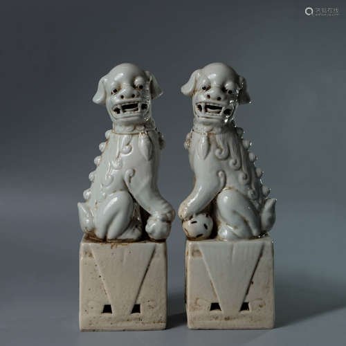 A Pair of Chinese White Porcelain Lion Ornaments