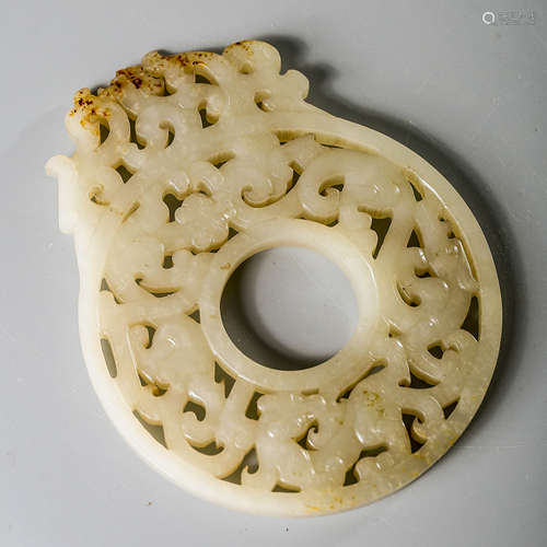 A Chinese White Hetian Jade Bi Ornament