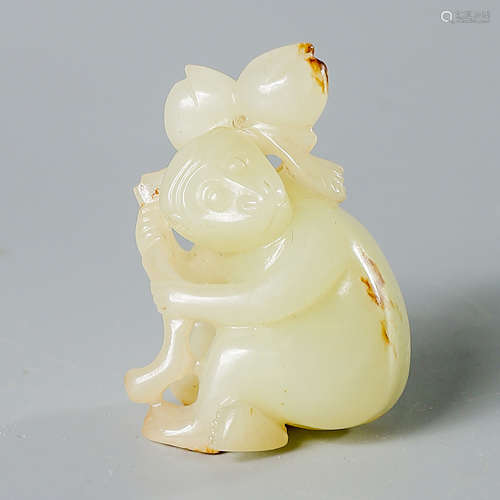 A Chinese White Jade Carved Monkey Ornament