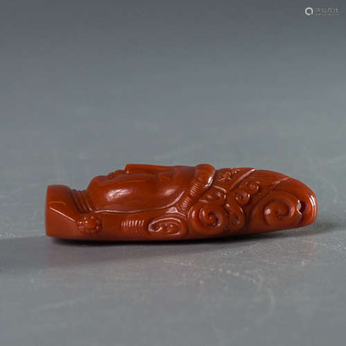 A Chinese South Red Agate Guanyin Ornament