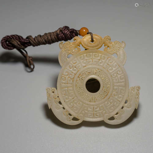 A Chinese Jade Carved Dragon Pendant