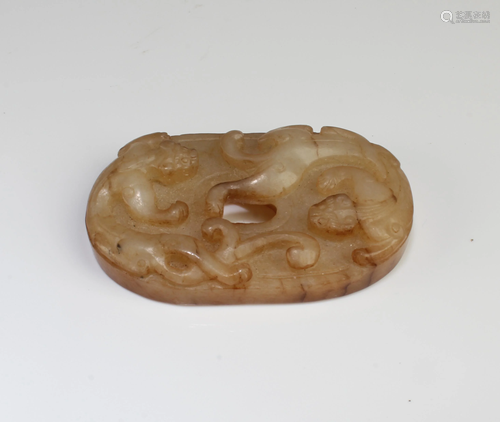 A Carved Jade Pendant