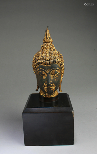 A Gilt Bronze Buddha Head