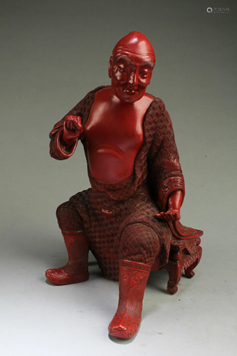 A Cinnabar Lacquer Figurine