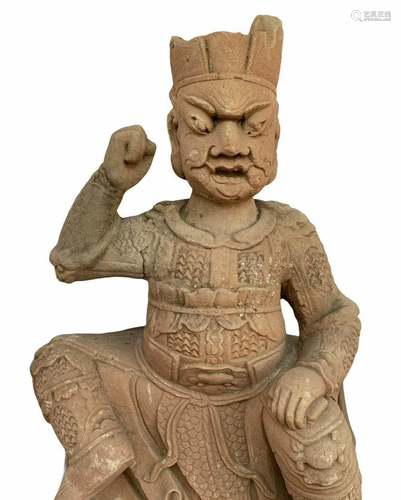 A Carved Stone Statue