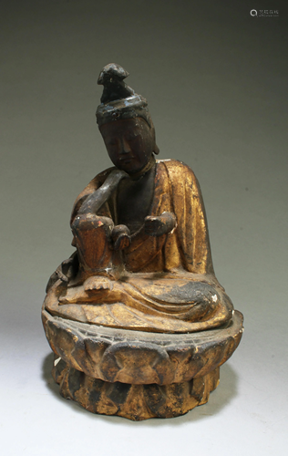 A Carved Wooden Guanyin Statue