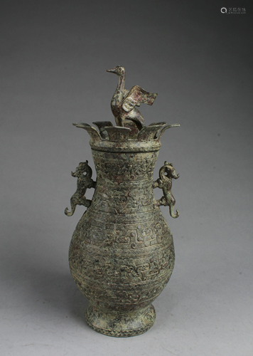 A Bronze Jar With Lid