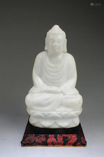 A Carved Stone Buddha Statue