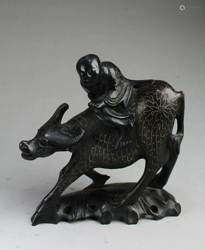 A Carved Wooden Water Buffalo Figurine