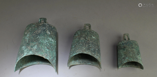 A Group of Three Bronze Bells