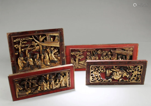 A Group of Four Chinese Carved Wooden Gilt Gold Plaque