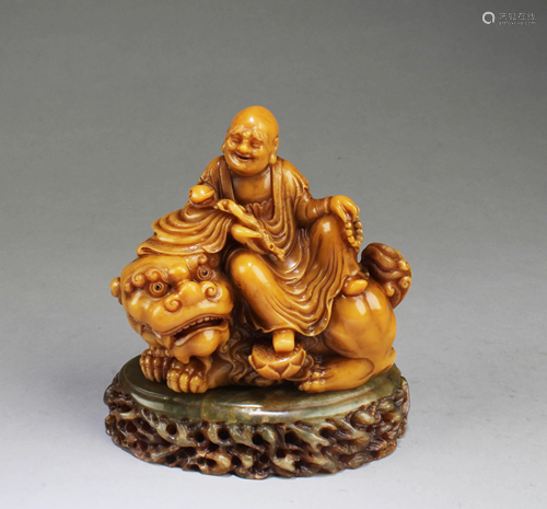 A Carved Soapstone Figurine