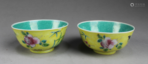 A Pair of Famille Jaune Bowls