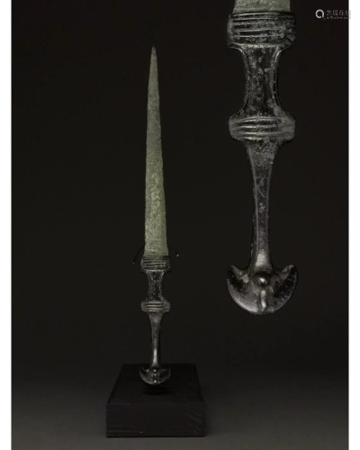 ANCIENT BRONZE SWORD WITH ELABORATE HANDLE