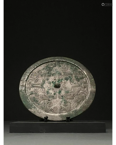 CHINA, TANG DYNASTY BRONZE DECORATED MIRROR