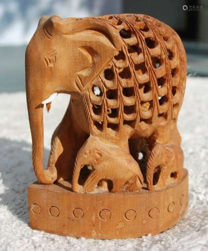 Hand Carved Wood Elephant with Perforated Body with Sculpture Inside