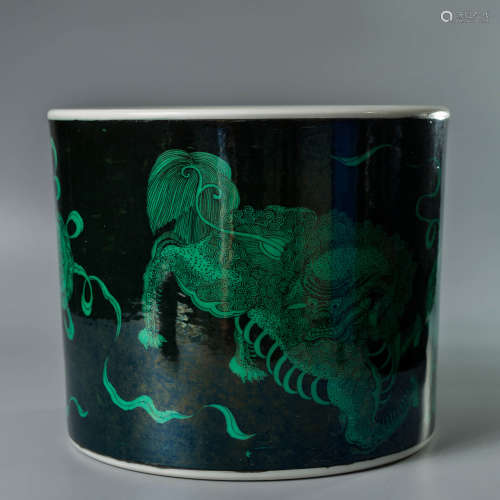 A CHINESE BLACK GROUND LION PAINTED PORCELAIN BRUSH POT