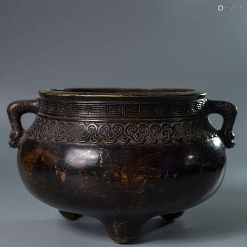 A CHINESE DOUBLE EARS THREE-LEGGED BRONZE INCENSE BURNER