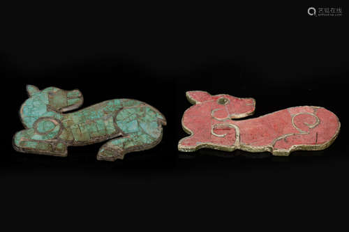 TWO PIGMENT PAINTED 'DOG' PLAQUES