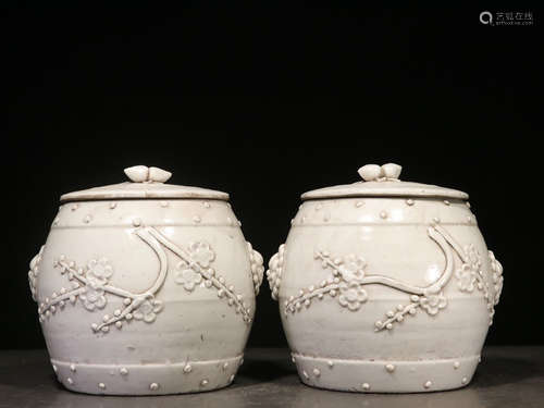 PAIR OF DEHUA BLANC DE CHINE 'PLUM FLOWERS' TEA JARS