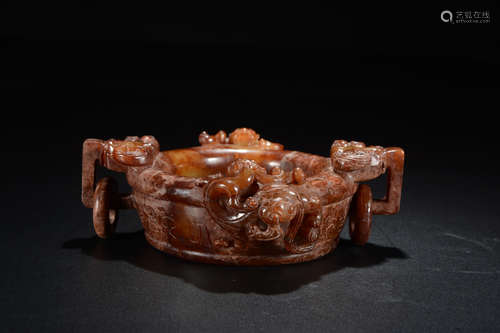 ARCHAIC JADE CARVED 'CHILONG' COMPRESSED RITUAL VESSEL WITH LOOPED RING HANDLES