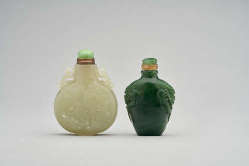 A celadon jade snuff bottle and a spinach jade snuff bottle  Late Qing dynasty and Republic period