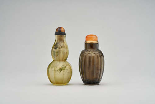 An inside painted glass snuff bottle and a rock crystal snuff bottle  Late Qing dynasty