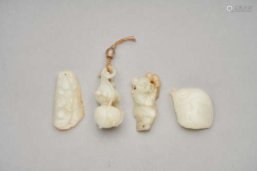 A group of four celadon jade pebbles  Qing dynasty