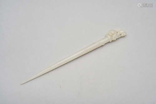 A white jade 'dragon and cloud' hairpin