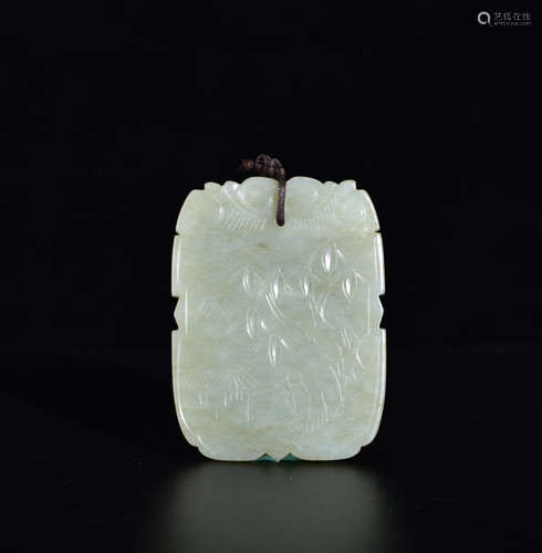 A WHITE JADE PLATE