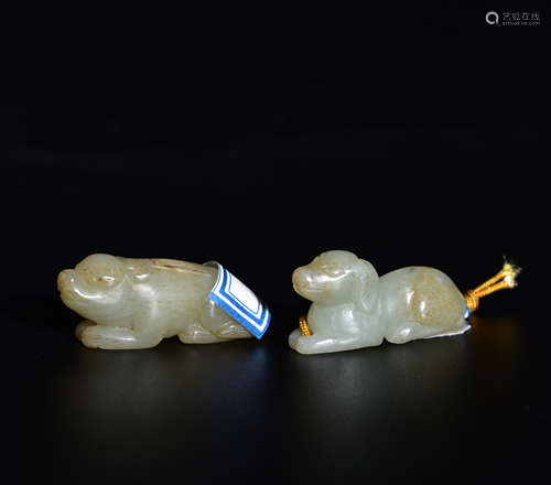 A PAIR OF AUSPICIOUS BEAST-SHAPED WHITE JADE