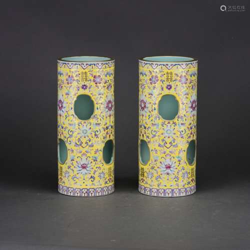 PAIR OF YELLOW-GROUND FAMILLE ROSE 'FLORAL' HAT STANDS, DAOGUANG MARK