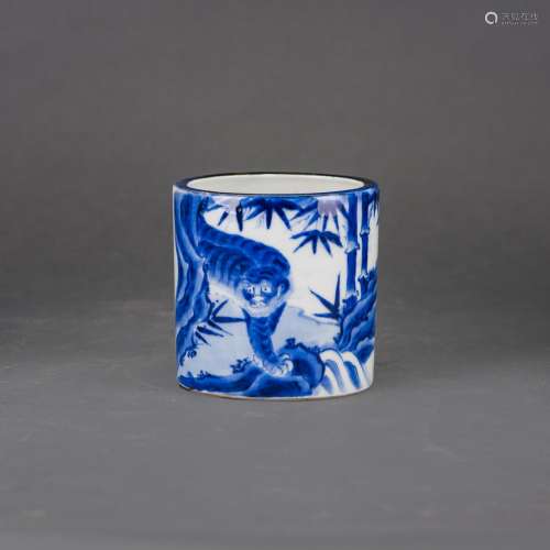 A BLUE AND WHITE 'TIGER' BRUSH POT