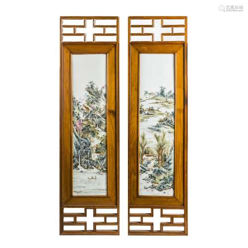A SET OF TWO CHINESE ENAMELLED PLAQUES WITH HUANGHUALI FRAME
