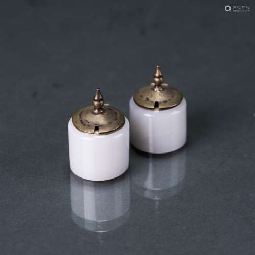 A PAIR OF WHITE JADE COVERED SILVER CONTAINNERS