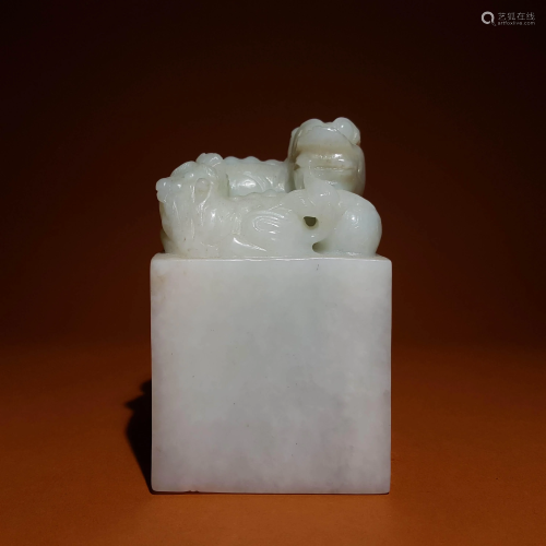 A CHINESE WHITE JADE SEAL