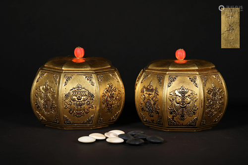 A PAIR OF GILT BRONZE CHINESE CHESS HOLDERS