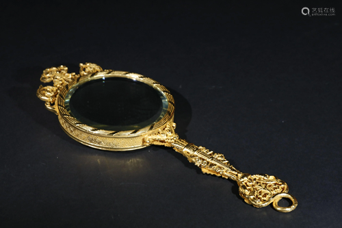 AN IMPORTED WESTERN STYLE GILT BRASS MIRROR