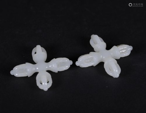 A PAIR OF CHINESE WHITE JADE PENDANTS