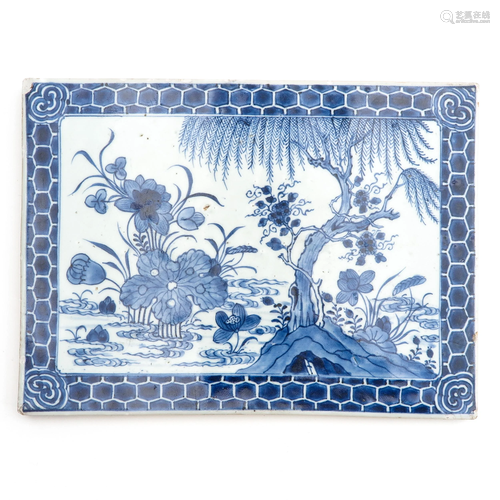 A Blue and White Tile