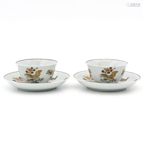 A Pair of Rooster Decor Cups and Saucers