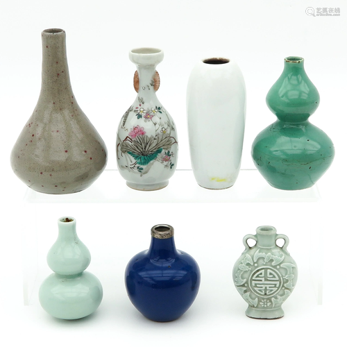 A Collection of 7 Vases