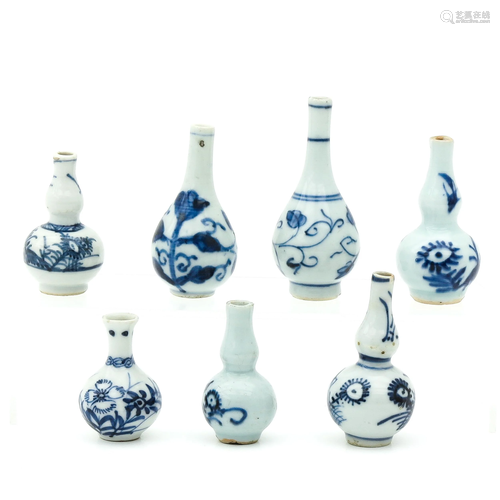 A Collection of 7 Miniature Vases