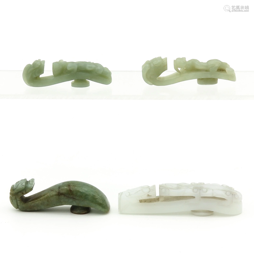 A Collection of 4 Jade Belt Hooks