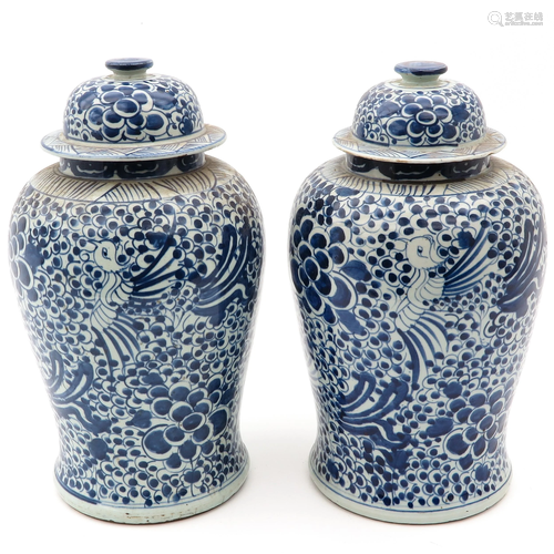 A Pair of Blue and White Jars with Covers