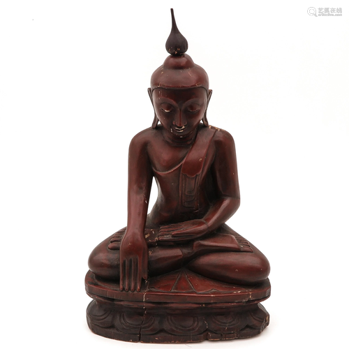 A Carved Wood Buddha Sculpture