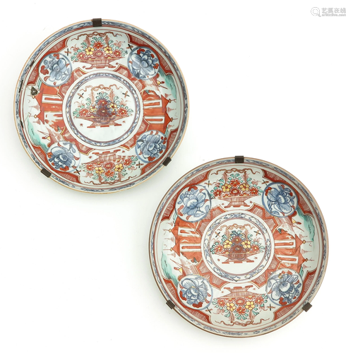 A Pair of Polychrome Decor Plates