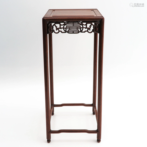 A Carved Wood Side Table